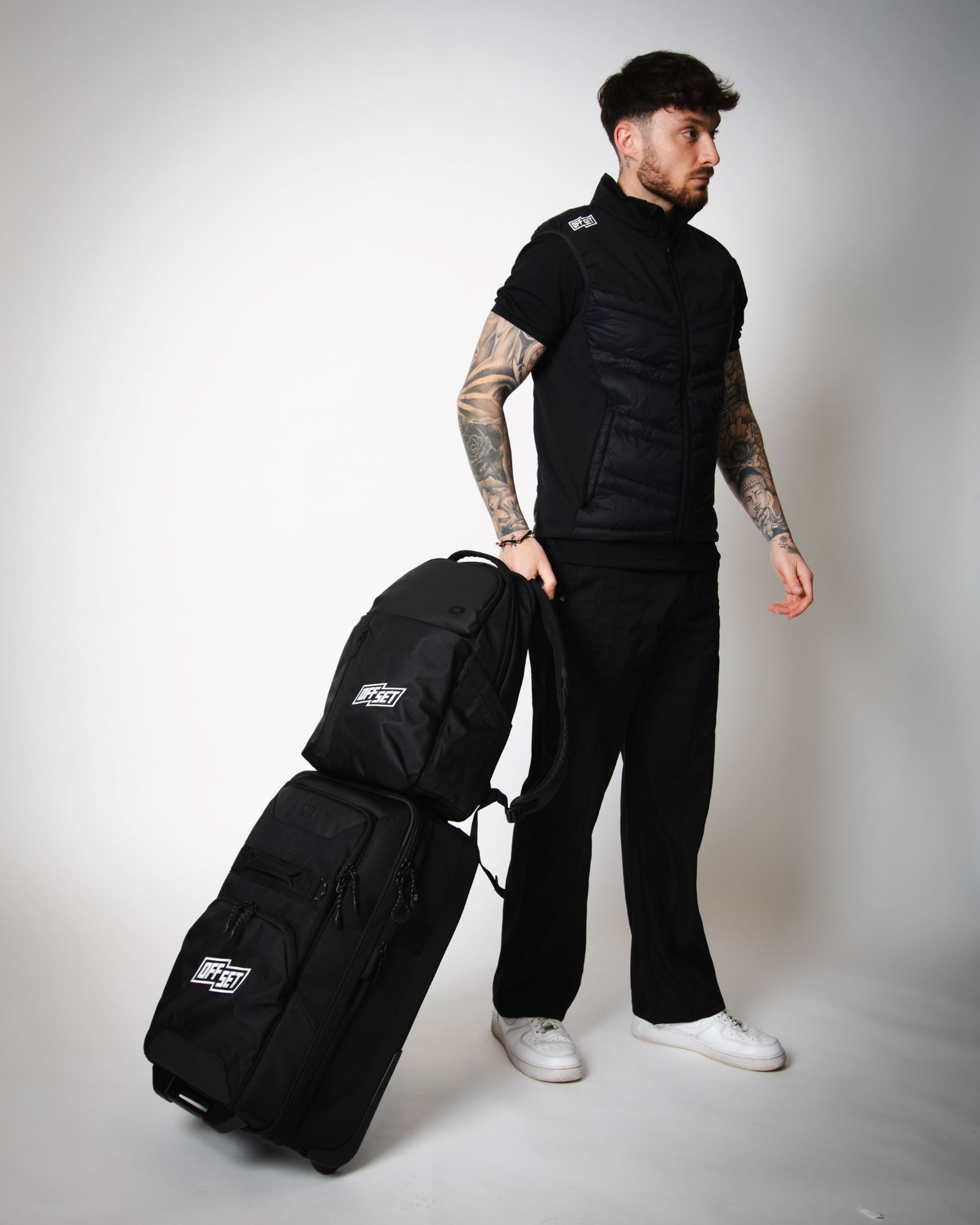 Man with Layover Pro Carry-On Bag