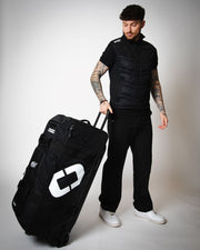 RIG ST Travel Bag | Heavy-Duty Gear Hauler | OFFSET Sport being wheeled