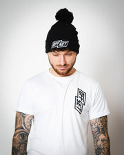 Close-up of OFFSET Sport bobble hat fabric and embroidered logo