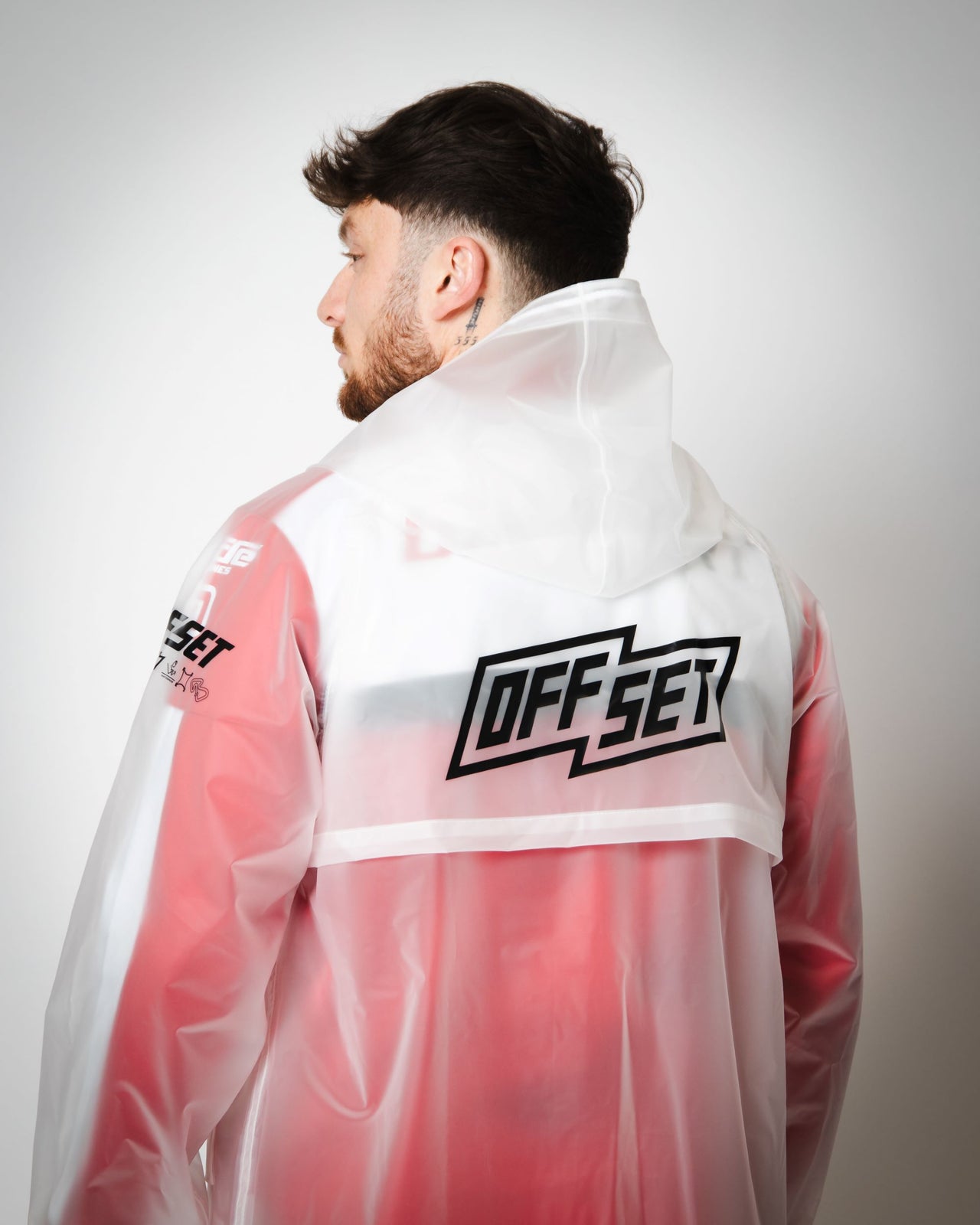 rear view of OFFSET Sport Clutch Rain Jacket – clear waterproof shell 