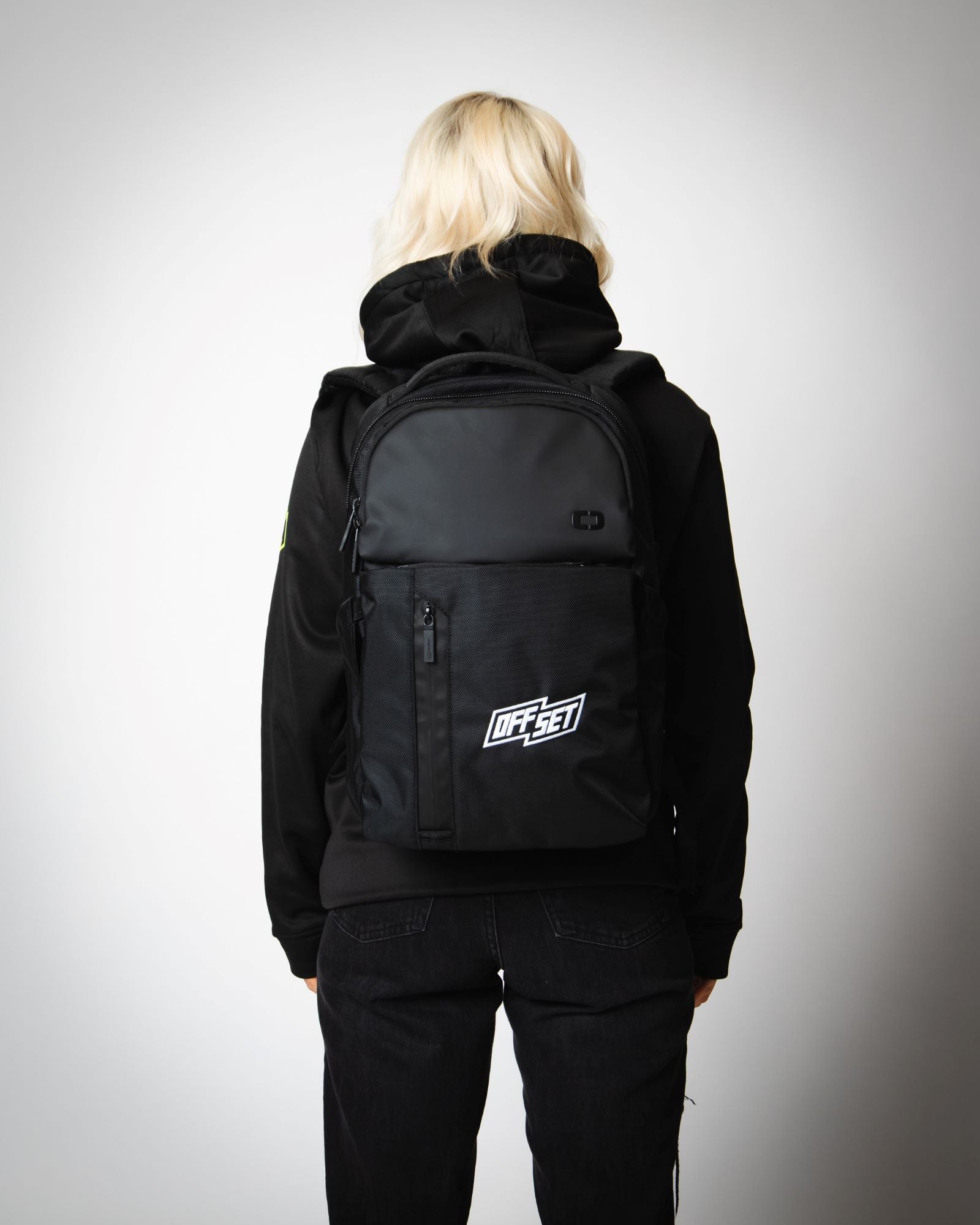 Woman wearing OGIO OFFSET Pace Pro 25L Backpack